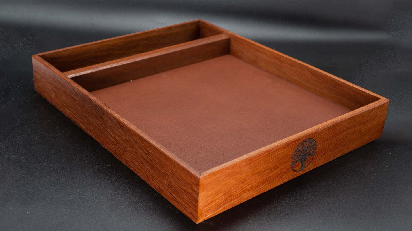 Jarrah is a beautiful wood and is a great match for this leather dice tray. The laser engraving in front looks beautiful. Roll your dice with confidence you won't lose them off the table. Dice rolling made easy, and with style. It has rubber feat to avoid scratches to your table and to keep it from sliding.